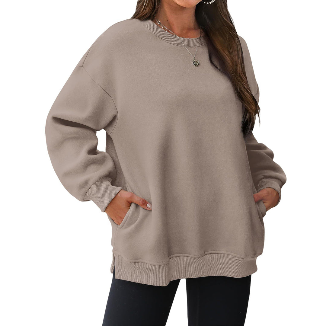 Women's extended oversized round neck sweater with side pockets, ribbed cuffs, and dropped shoulder Mune Fashion