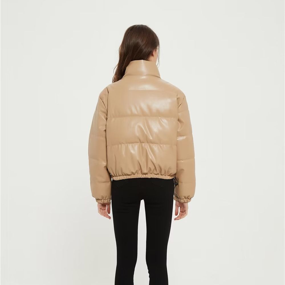 Women's short padded faux leather puffer jacket with high stand-up collar, snap button placket and drawstring hem Mune Fashion