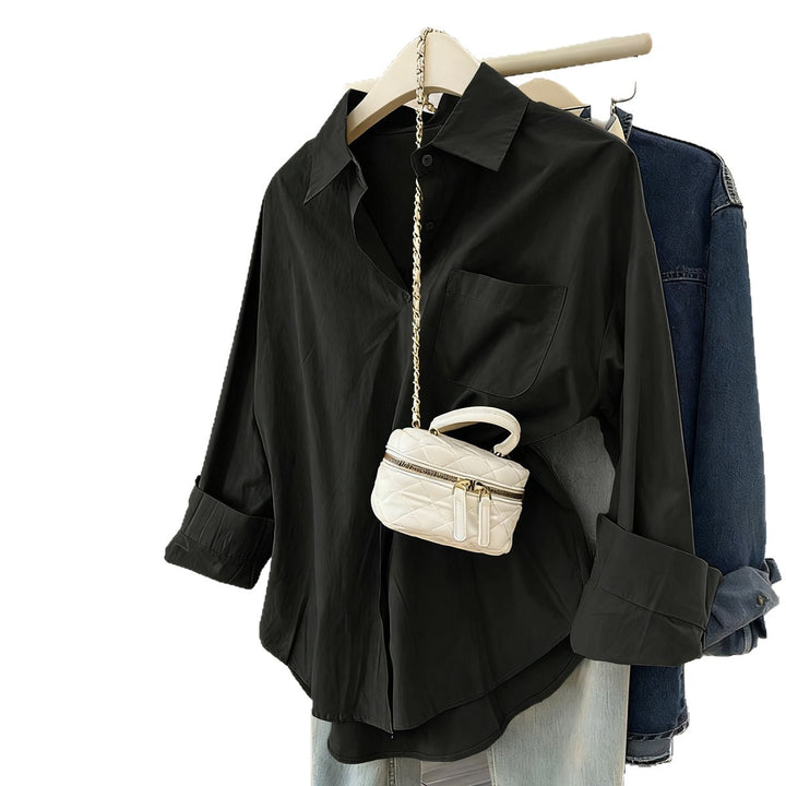 Women's oversized shirt blouse with chest pocket, turned-up sleeves and relaxed fit Mune Fashion