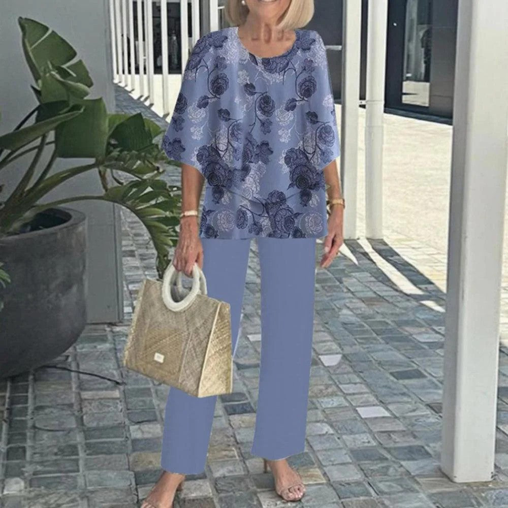 Women's layered tunic with cape sleeves and ankle-length straight leg pants with graphic print Mune Fashion