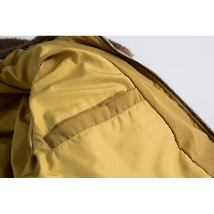 Women's cropped padded bomber jacket with teddy collar and flap pockets Mune Fashion
