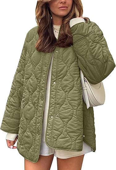 Women's quilted jacket in oversized design with curved quilting and side slit Mune Fashion