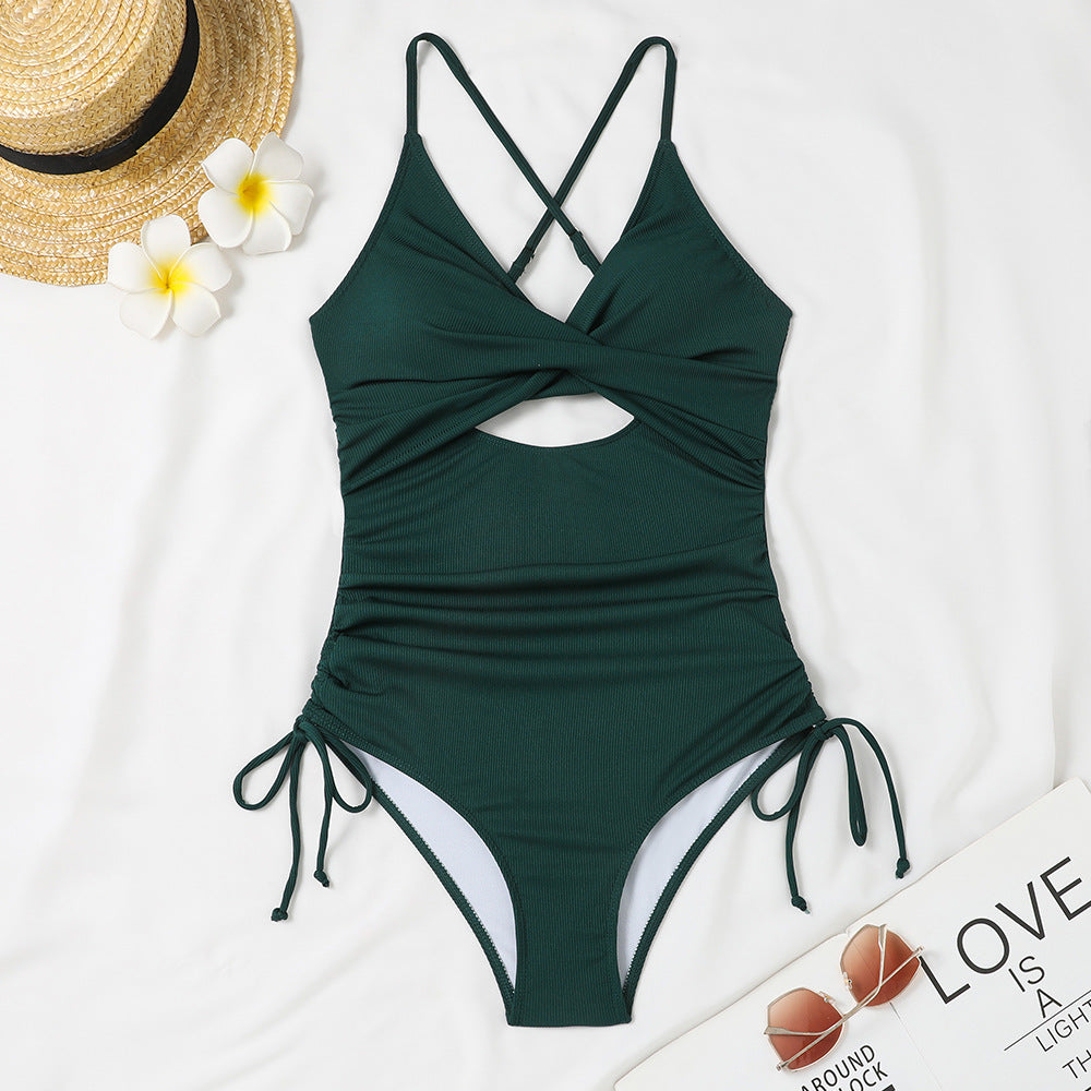 Women's one-piece swimsuit with sophisticated wrap design and trendy cut-out Mune Fashion
