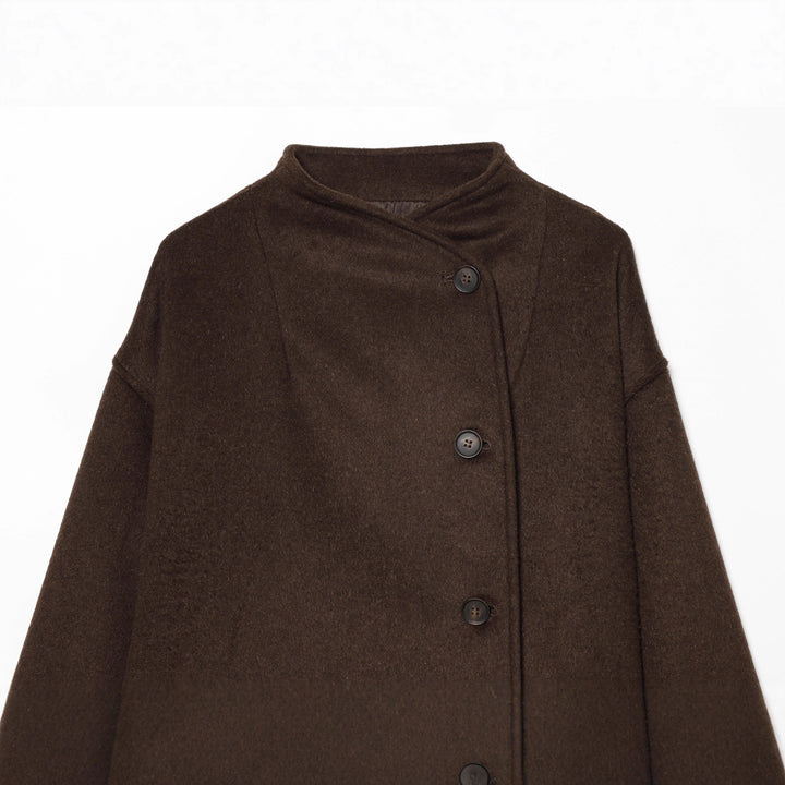 Ladies short wool cape with asymmetrical button placket Mune Fashion