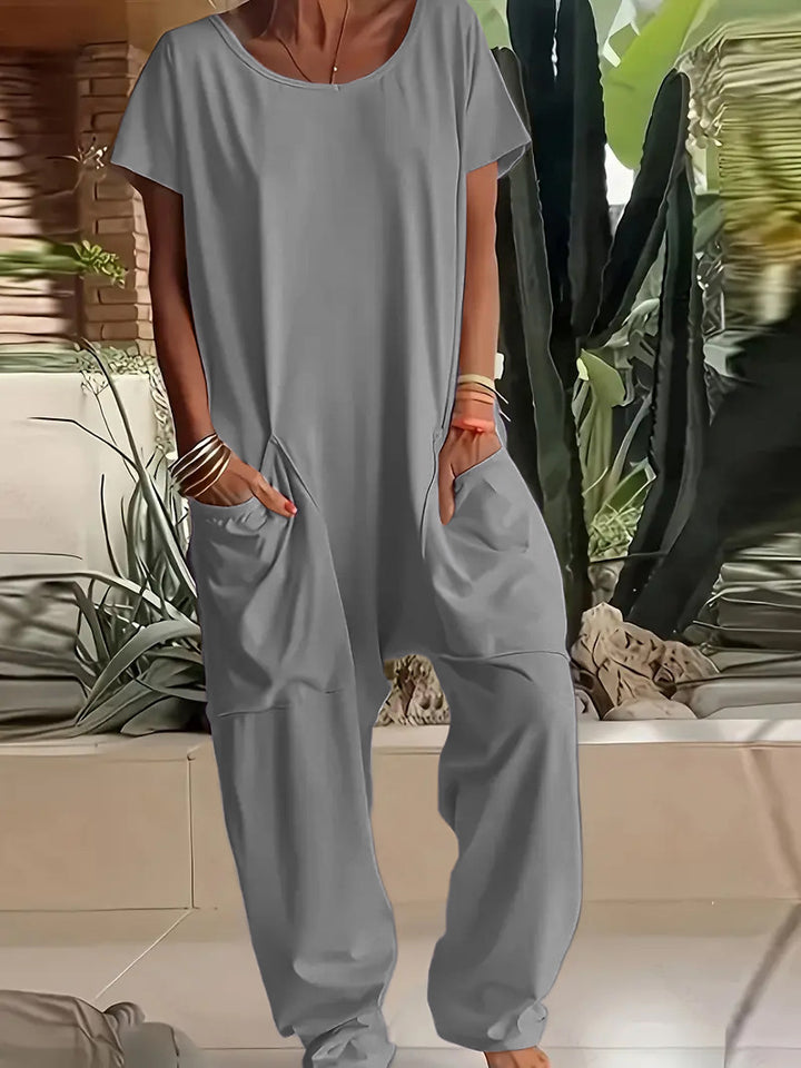 Women's comfortable oversized jumpsuit with V-neck, deep crotch and inset pockets Mune Fashion