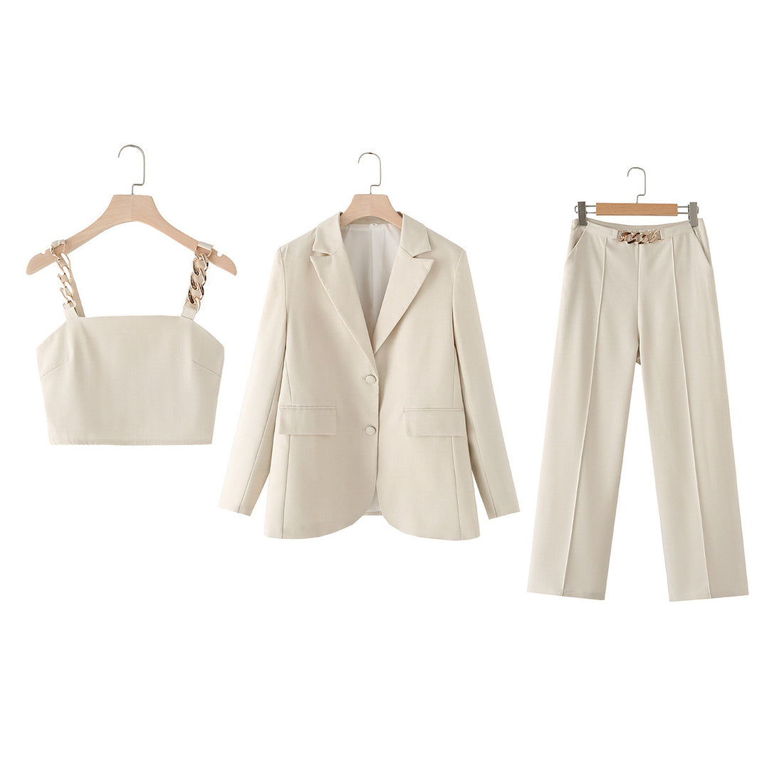 Ladies' three-piece suit set with chain crop top, loose blazer, and high-waisted pleated trousers Mune Fashion