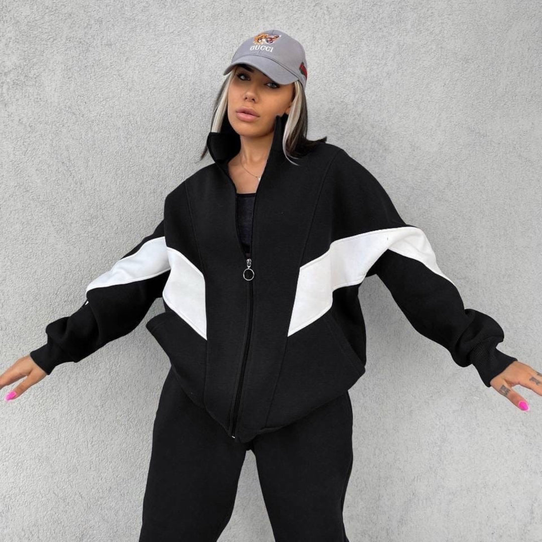 Women's athletic training set with ring zipper, inset pockets, and contrasting arm panels Mune Fashion