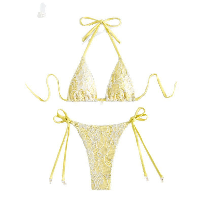 Ladies triangle bikini with fine lace pattern and playful bow detail Mune Fashion