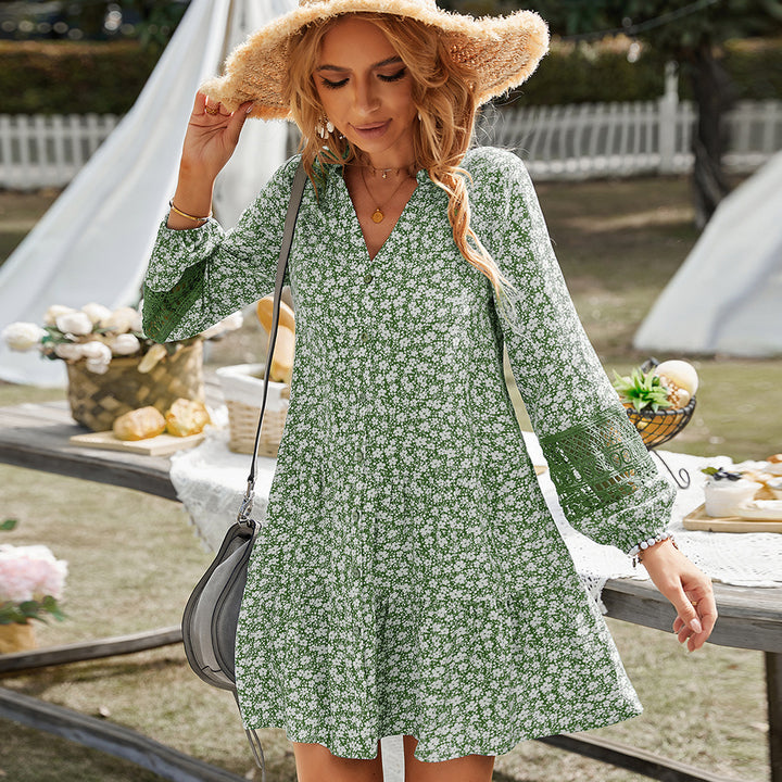 Women's floral tiered mini dress with V-neck, full button placket, and crocheted balloon sleeves Mune Fashion