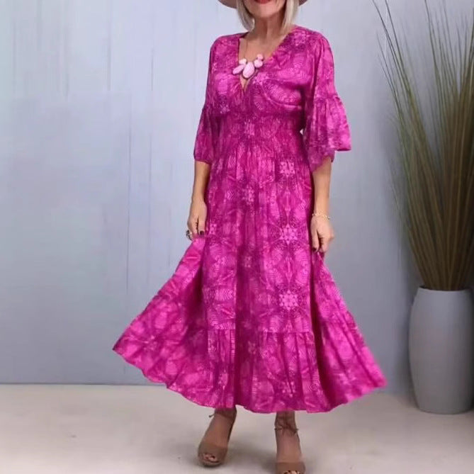 Women's flowing kaftan midi dress with V-neck, loose silhouette, tiered skirt, and three-quarter sleeves Mune Fashion