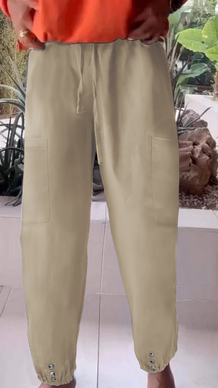 Ladies cargo jogging pants with drawstring, patch pockets and button cuffs Mune Fashion