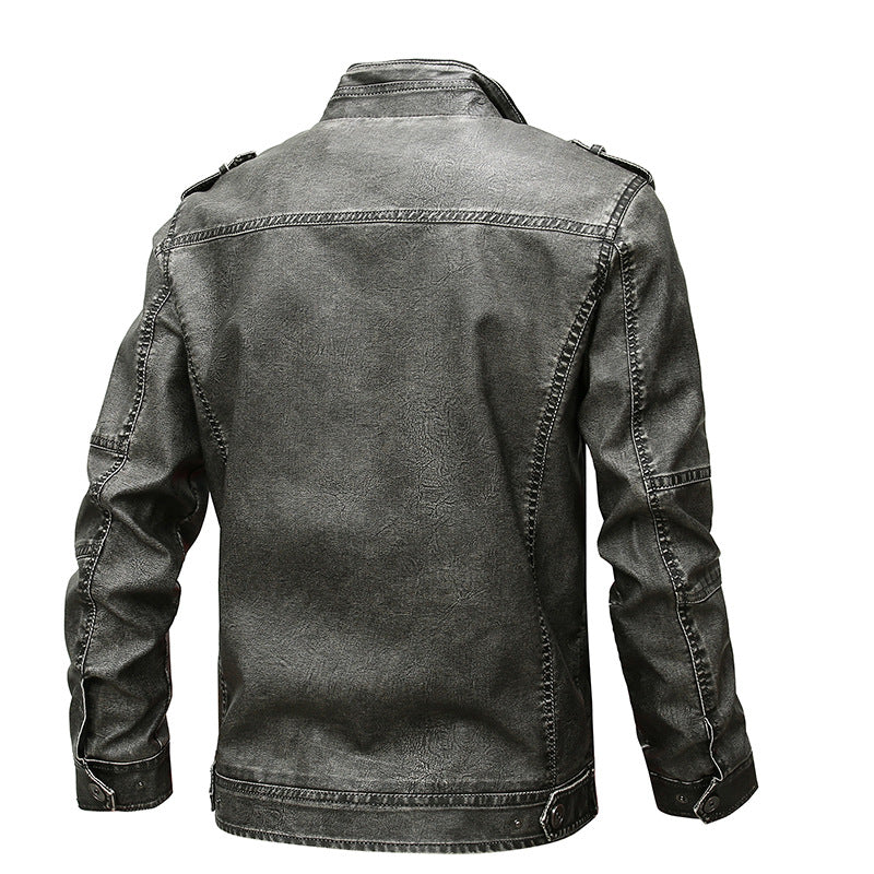 Men's biker jacket made of synthetic leather with stand-up collar, striking decorative seams, and multiple pocket details Mune Fashion