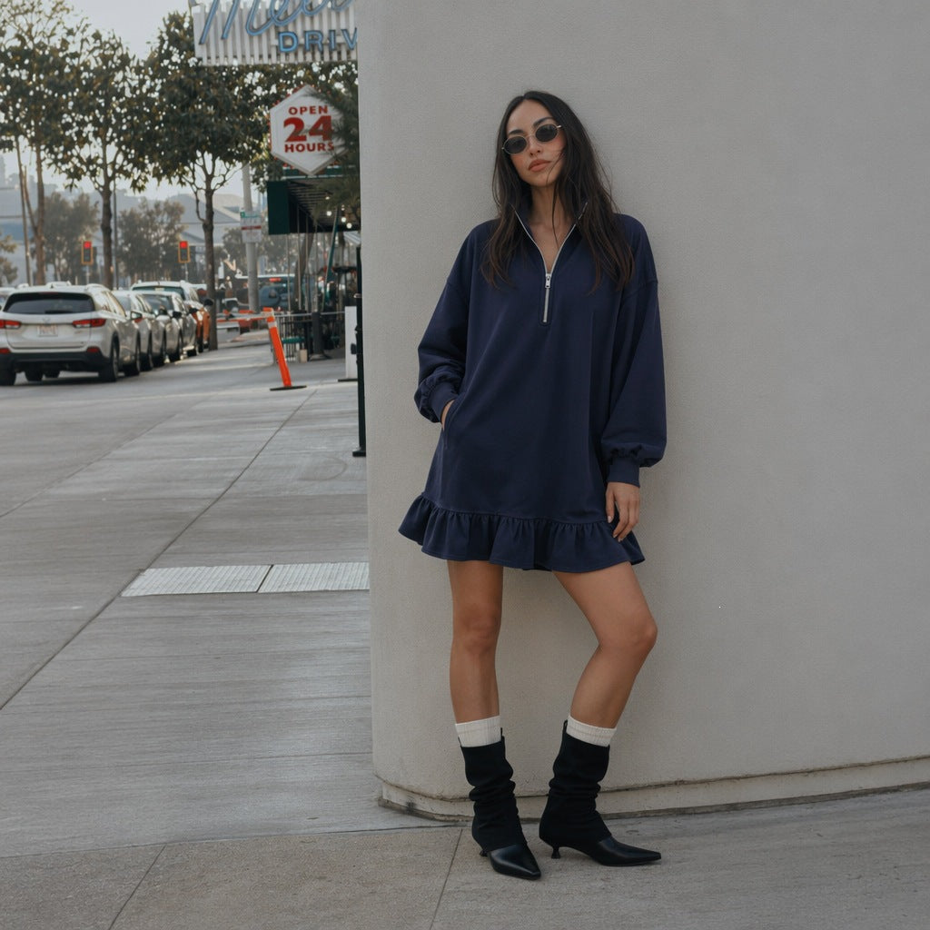 Women's oversized sweat dress with half zipper, balloon sleeves, side pockets, and ruffle hem Mune Fashion