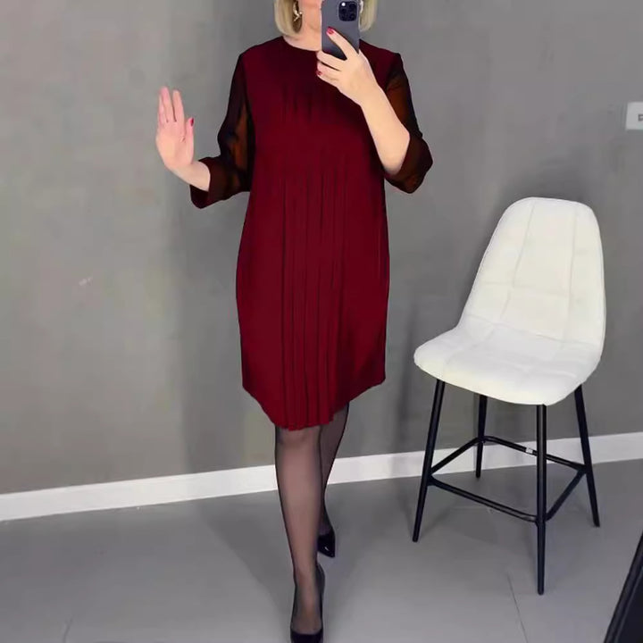 Ladies nan pleated sheath dress with knee-length silhouette and transparent three-quarter sleeves Mune Fashion