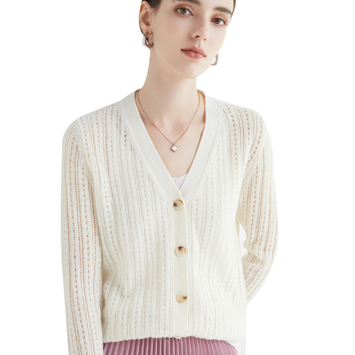 Women's ultralight mock neck pullover made of cashmere-like fine knit with extended hemline.