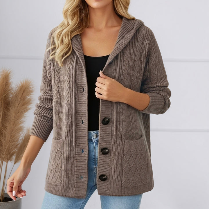 Women's knitted hooded cardigan with ribbed pattern, large wooden buttons, and patch pockets Mune Fashion