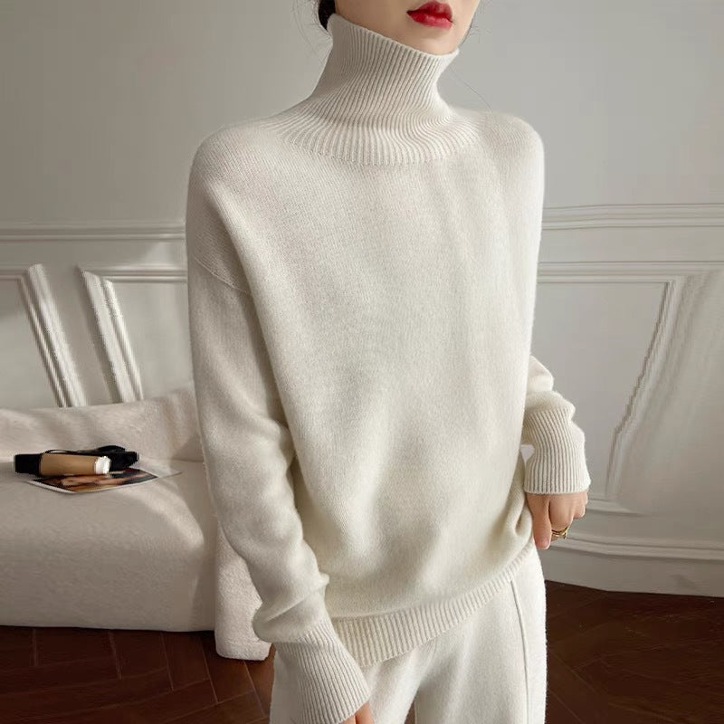 Women's Oversized Fine Knit Sweater with High Roll Neck and Side Slits Mune Fashion