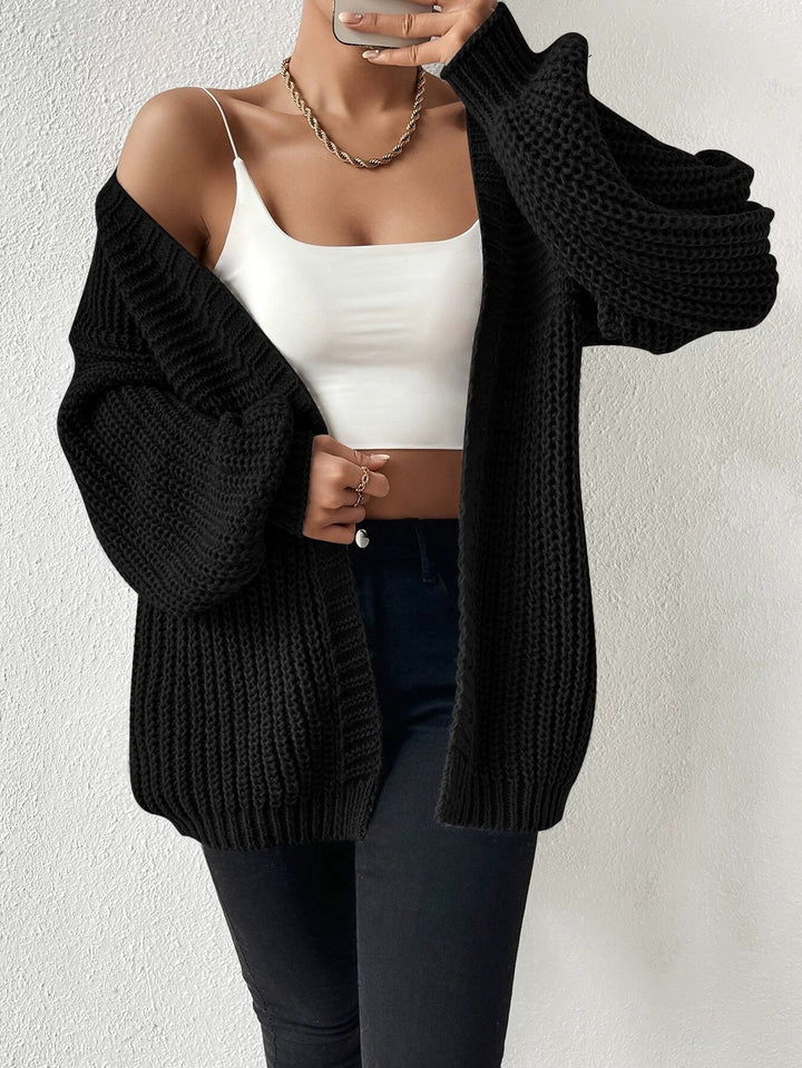 Women's oversized knit cardigan with coarse waffle knit, open front and voluminous balloon sleeves Mune Fashion