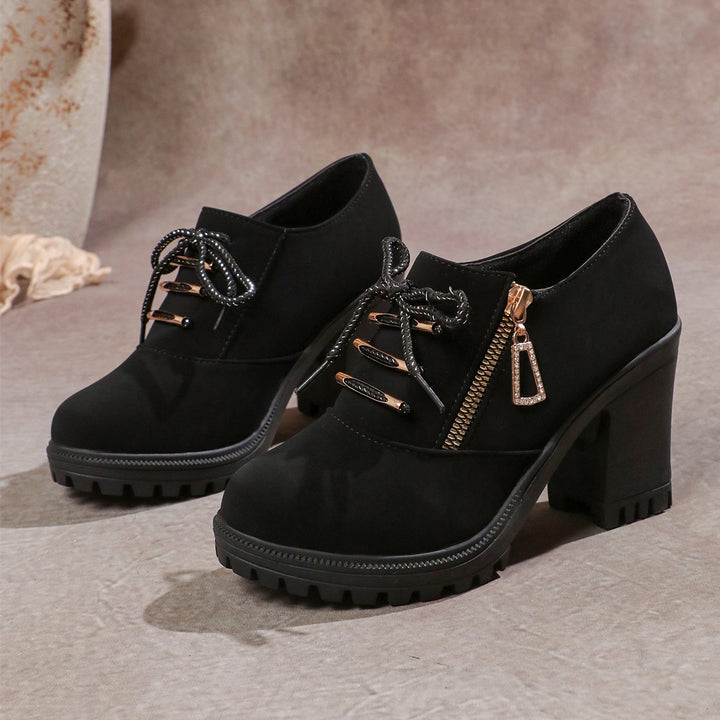 Women's elegant lace-up booties with sturdy block heel, side zipper, and decorative pendant Mune Fashion