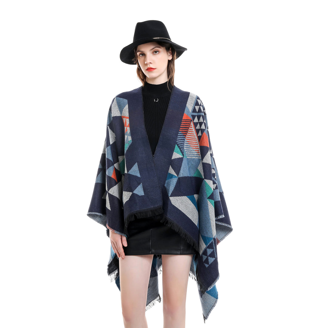 Women's oversized ruana in jacquard wrap style with triangular pattern and fringe hem Mune Fashion