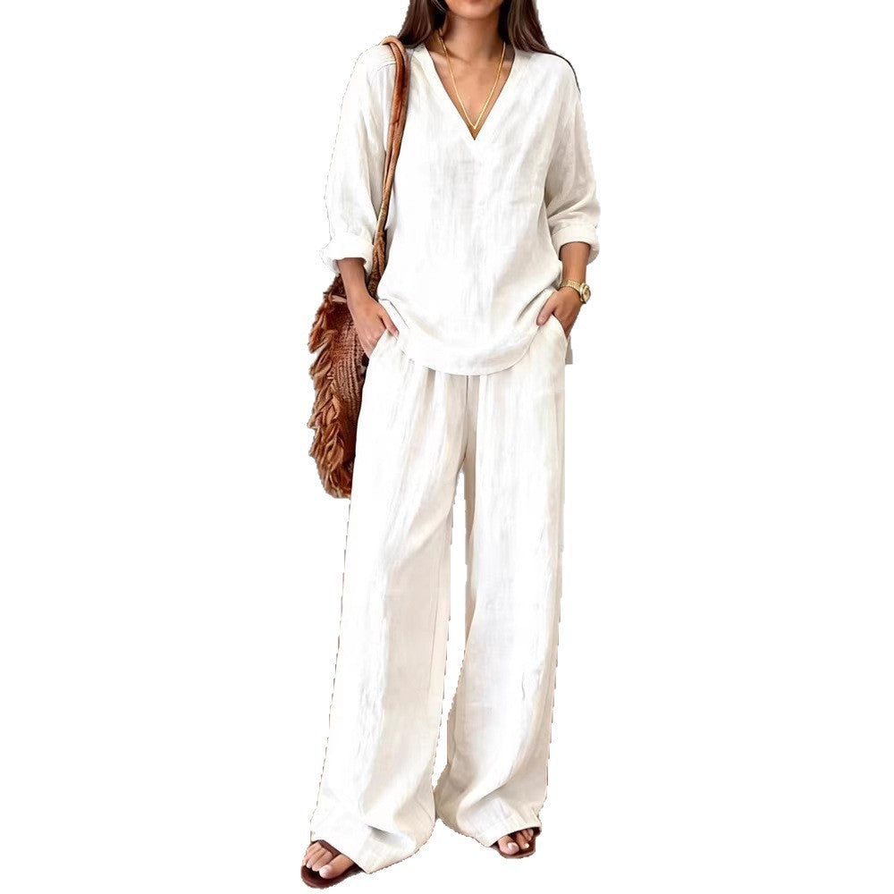 Women's lightweight linen look two-piece set with deep V-neck, loose 3/4 sleeves, and wide palazzo pants cut Mune Fashion