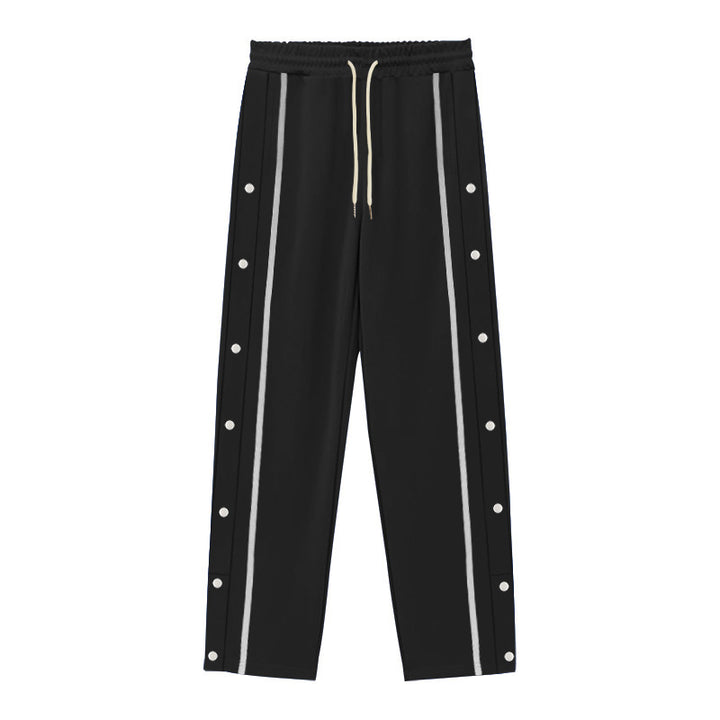 Men's Nan sporty jogging pants with side snap button placket, elastic drawstring waistband, and striking side stripes Mune Fashion