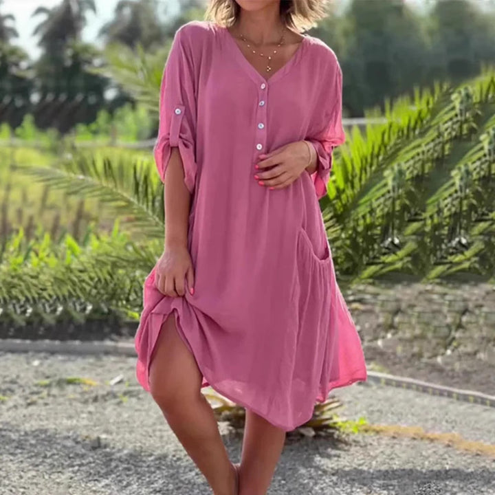 Ladies light V-neck tunic dress with button placket, patch pocket and roll-up sleeves Mune Fashion