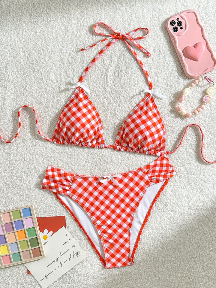 Women's triangle bikini with adjustable lacing details and charming ruffled accents Mune Fashion