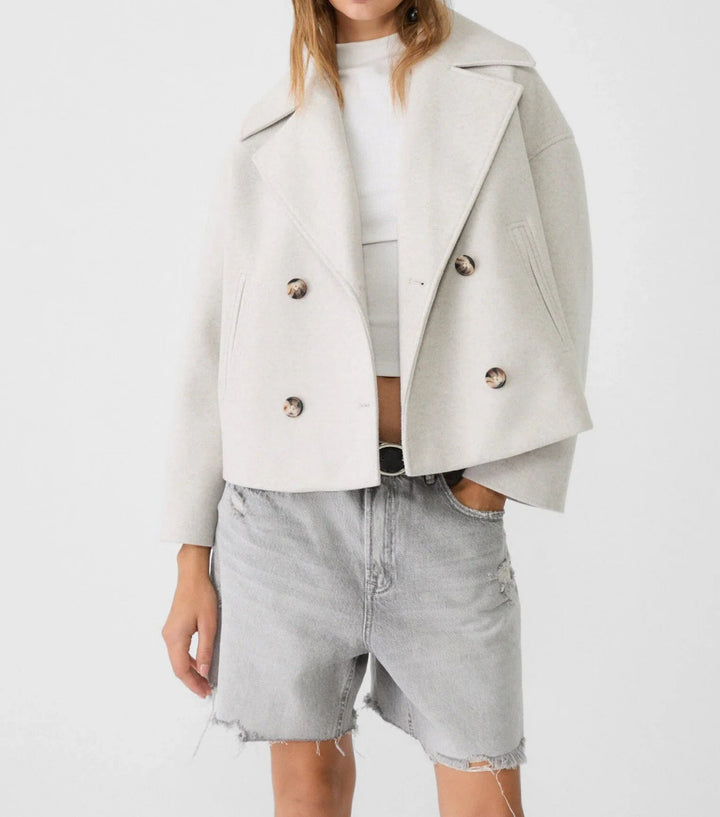 Women’s short cut double-breasted wool blend peacoat with wide lapels and boxy silhouette Mune Fashion
