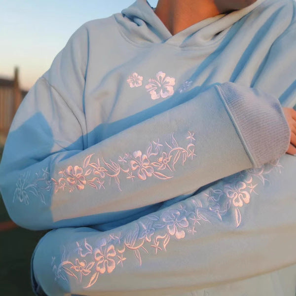 Women's hooded sweatshirt with floral embroidery and printed hood lining Mune Fashion
