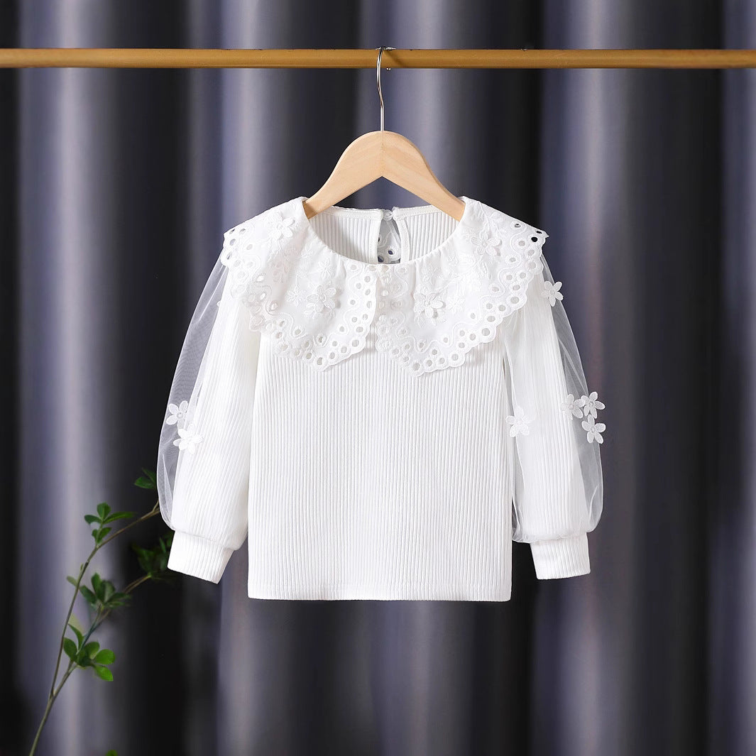 Girl's blouse with voluminous tulle sleeves and elaborate flower embroideries Mune Fashion
