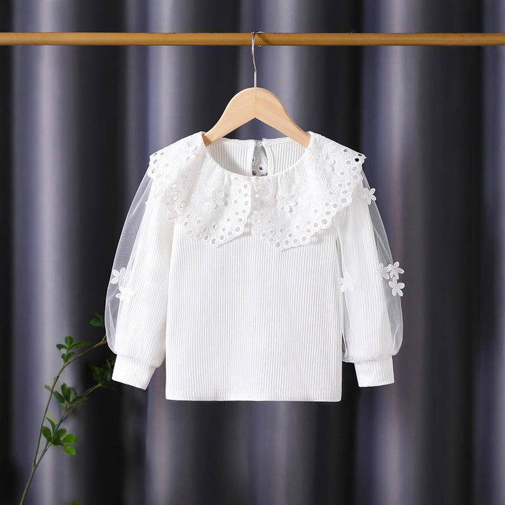 Girl's blouse with voluminous tulle sleeves and elaborate flower embroideries Mune Fashion