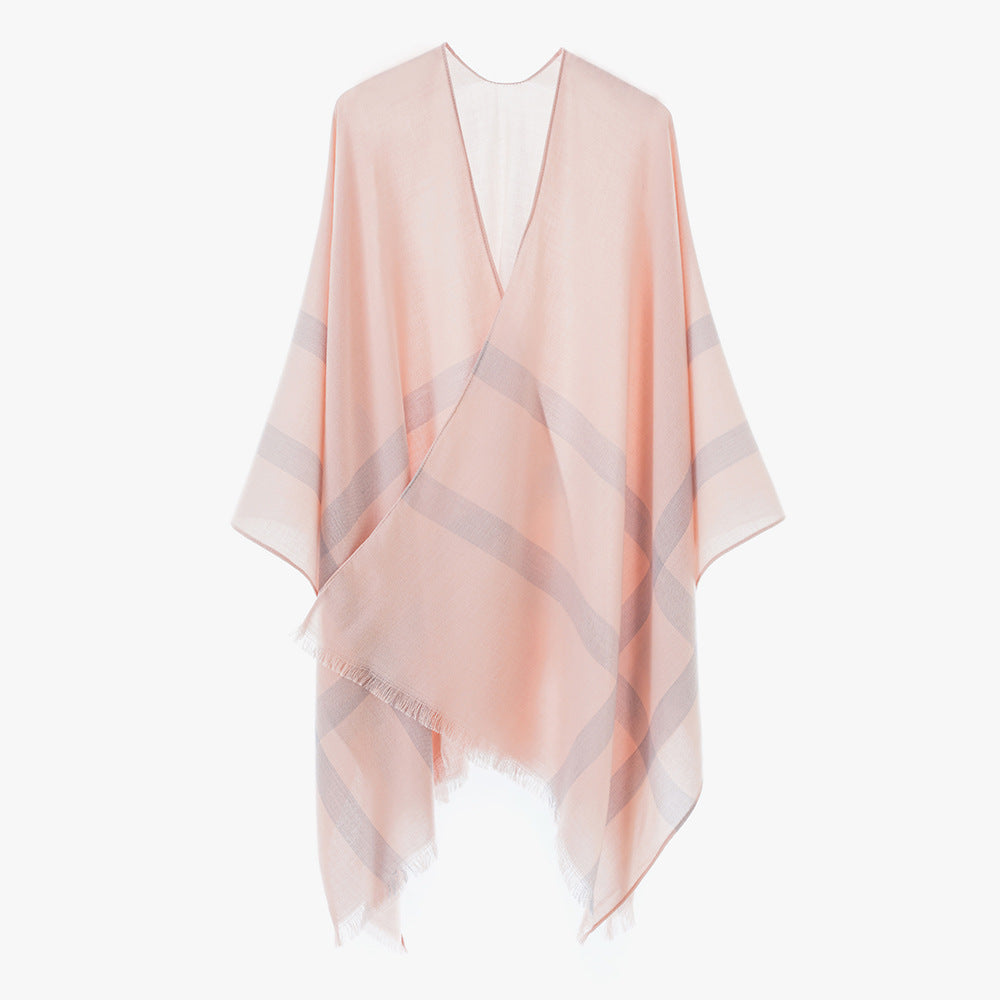 Women’s lightweight fine knit cape with diagonal contrasting stripes and fringes Mune Fashion