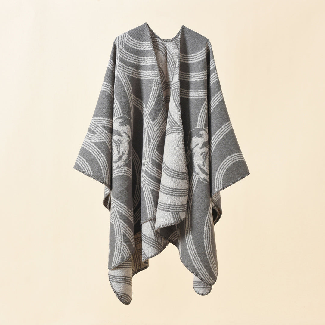 Ladies' collarless jacquard cape in a boxy oversized style with abstract medallion pattern