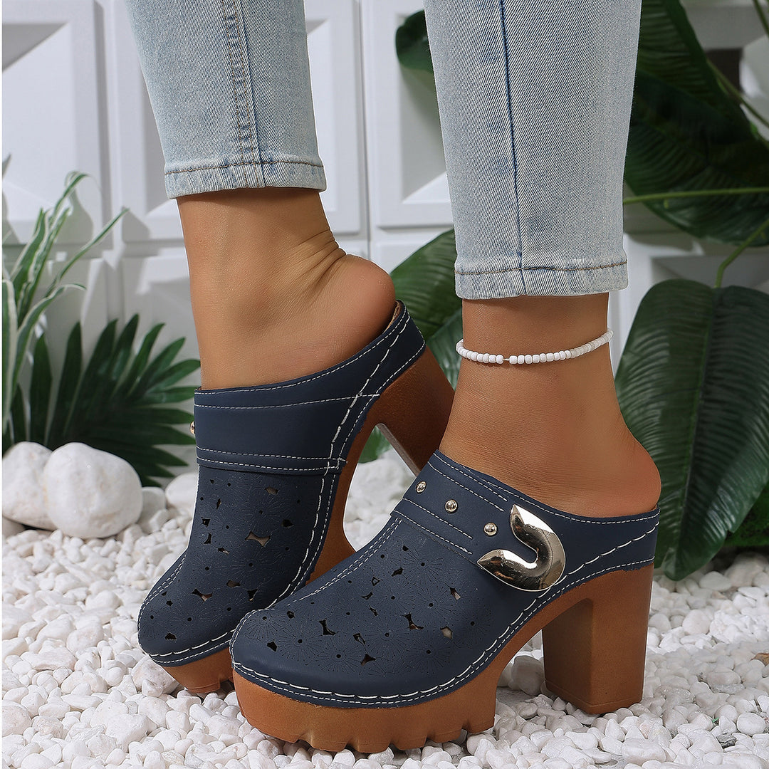 Women's platform clogs with floral perforation pattern, decorative metal buckle and high block heel Mune Fashion