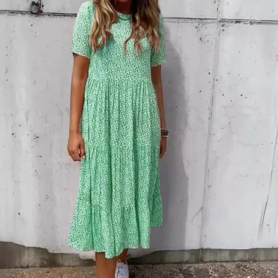 Women's floral crinkled midi dress with gathered empire waist, short sleeves, and tiered ruffle skirt Mune Fashion