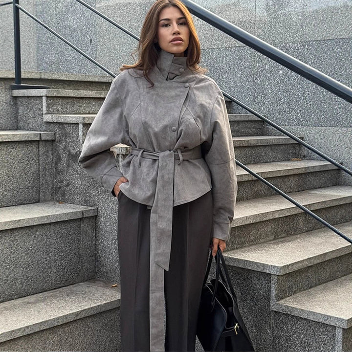 Women's short jacket made of faux suede with a high stand-up collar, waist belt, and boxy oversized silhouette Mune Fashion