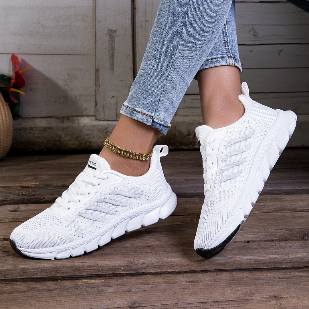 Women's knitted slip-on sneakers with elastic shaft, decorative lacing, and segmented cushioning sole Mune Fashion