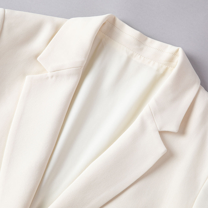 Women Longline Blazer with straight cut and discreet flap pockets Mune Fashion