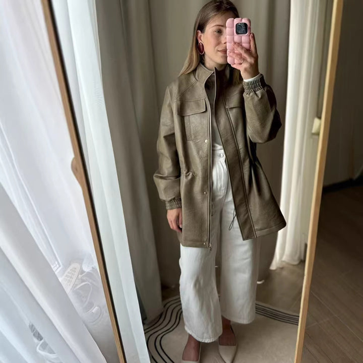 Women's faux leather parka with drawstring waist, stand-up collar, and flap pockets Mune Fashion