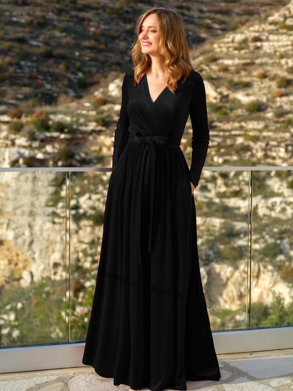 Women's elegant wrap maxi dress made of velvet with V-neck, waist belt, and side pockets Mune Fashion