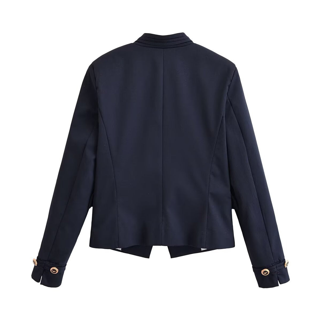Women's short blazer with stand-up collar, gold-colored decorative buttons, and patch pockets Mune Fashion