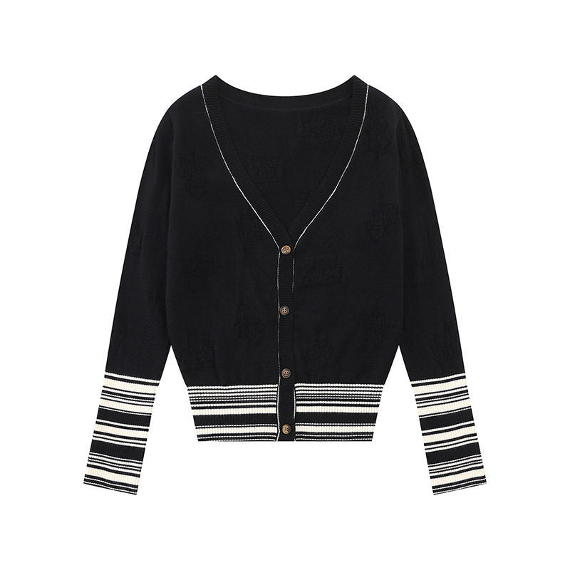 Ladies cardigan with V-neck, fine jacquard pattern and contrasting cuffs Mune Fashion