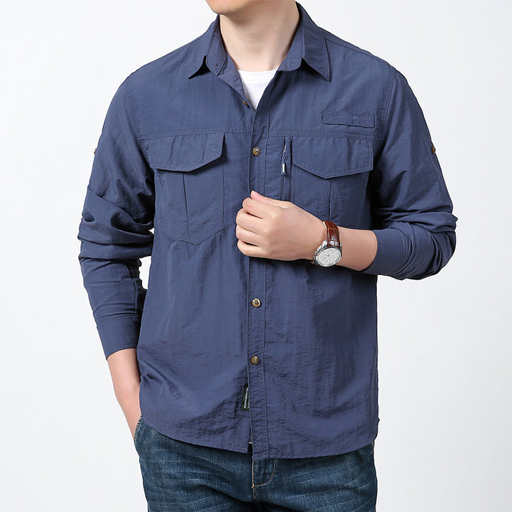 Men's long-sleeved field shirt made of lightweight ripstop with multifunctional chest pockets and concealed zip.