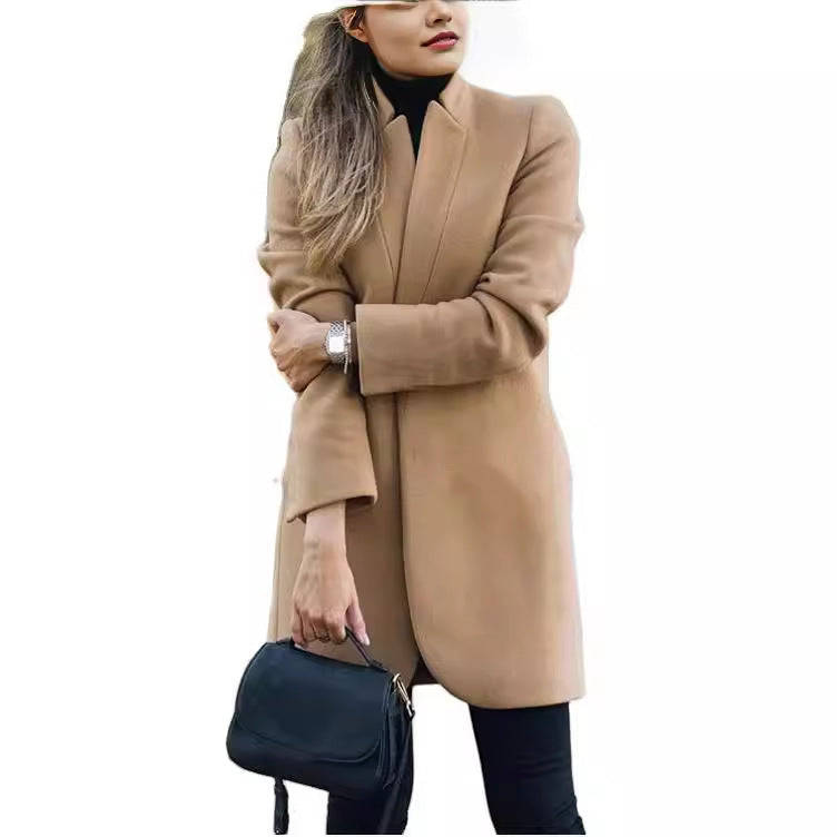 Women's tailored wool blend coat with concealed button placket and shaping darts Mune Fashion