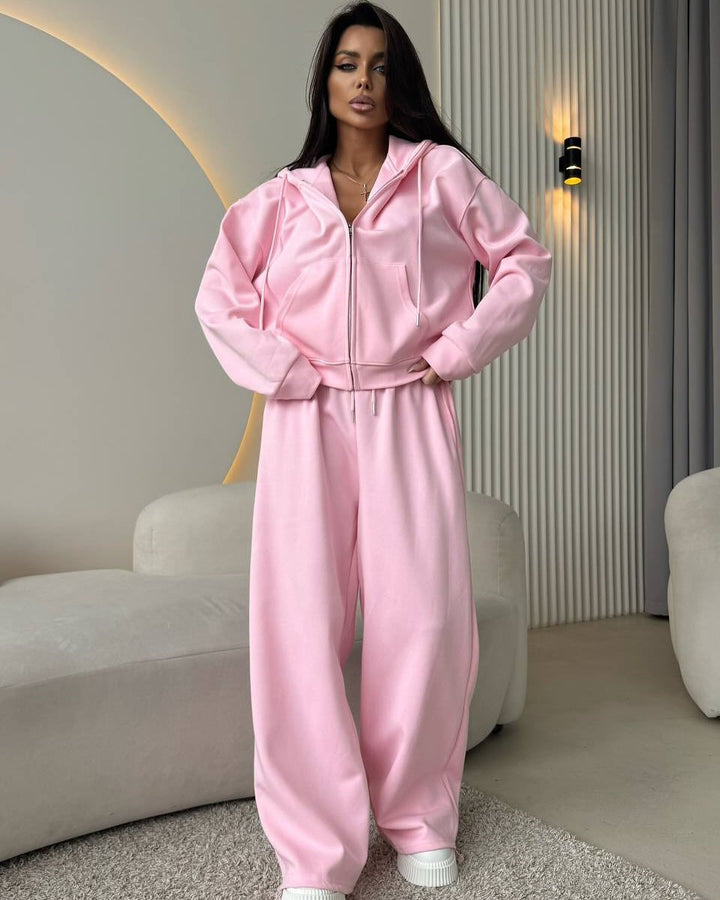 Women's loose high-waist lounge pants made of sweatshirt fabric with drawstring and side pockets Mune Fashion