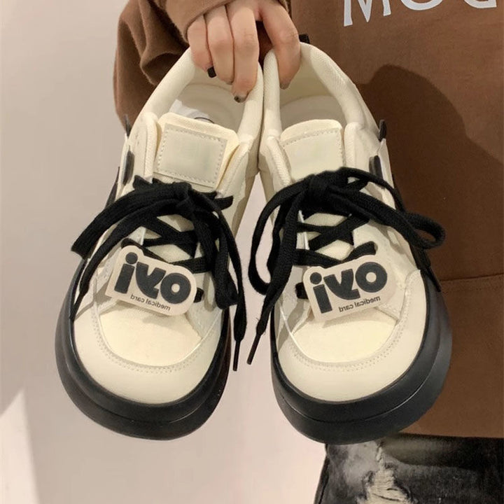 Women's Retro Canvas Platform Sneaker with distinctive rubber sole and logo detail Mune Fashion