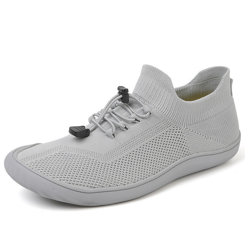 Unisex slim-knit slip-on trainer with toggle lacing and ultra-flexible minimal sole Mune Fashion