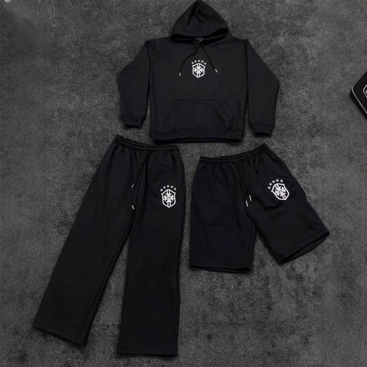 Women's loose jogging pants with elastic waistband, drawstring, and embroidered emblem Mune Fashion