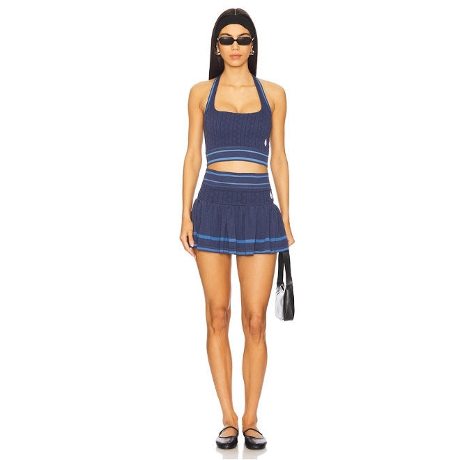 Ladies knitted sports set with halter crop top and flared pleated mini skirt Mune Fashion